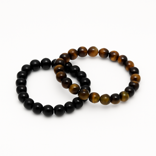 Yellow Tiger Eye energizes your mind, sharpens decisions, and balances emotions, while Obsidian grounds you, blocks negativity, and deepens self-awareness.