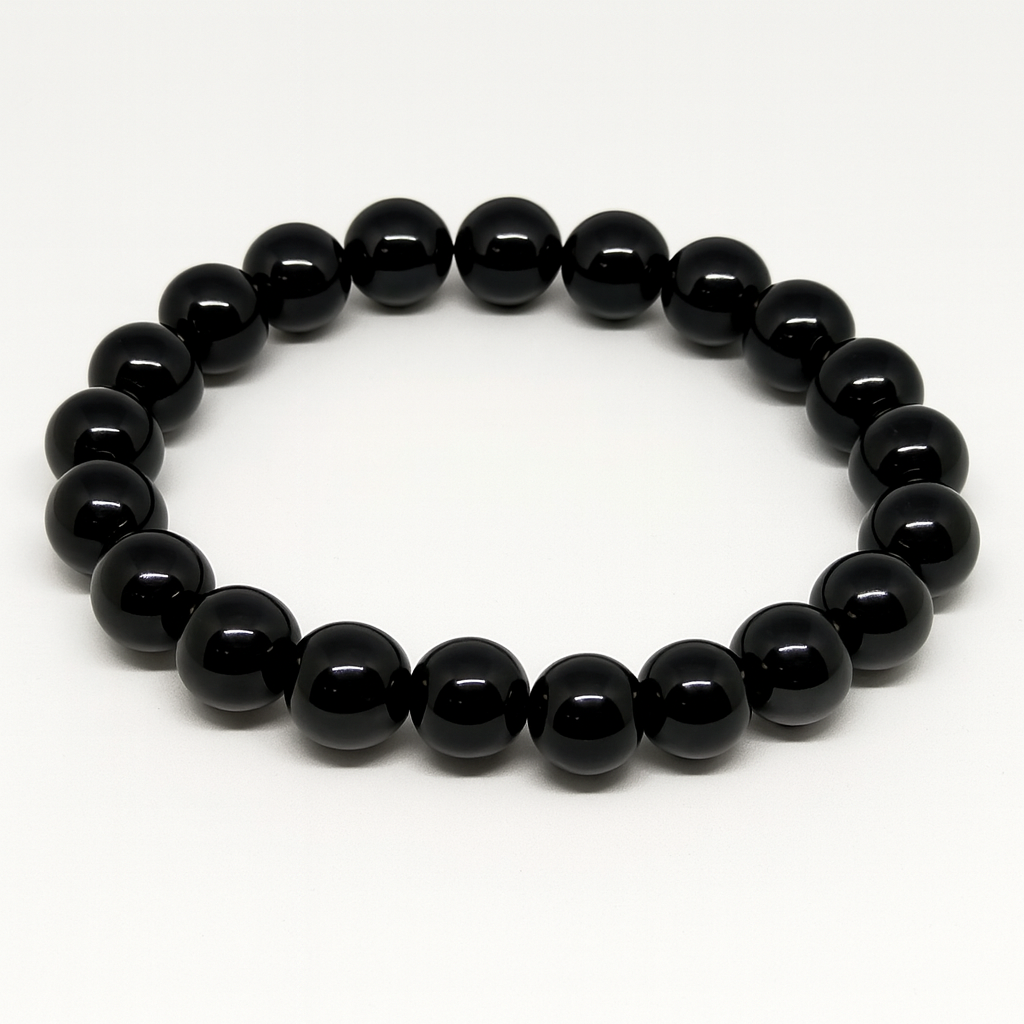 Yellow Tiger Eye energizes your mind, sharpens decisions, and balances emotions, while Obsidian grounds you, blocks negativity, and deepens self-awareness.