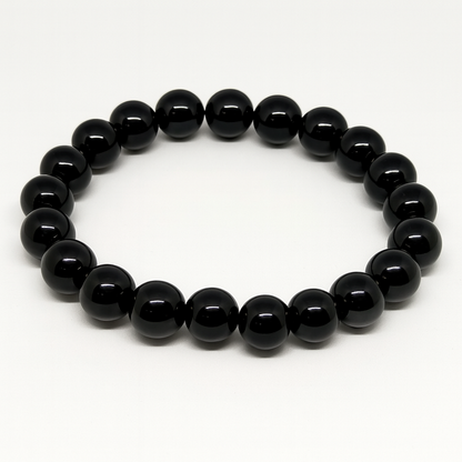 Yellow Tiger Eye energizes your mind, sharpens decisions, and balances emotions, while Obsidian grounds you, blocks negativity, and deepens self-awareness.